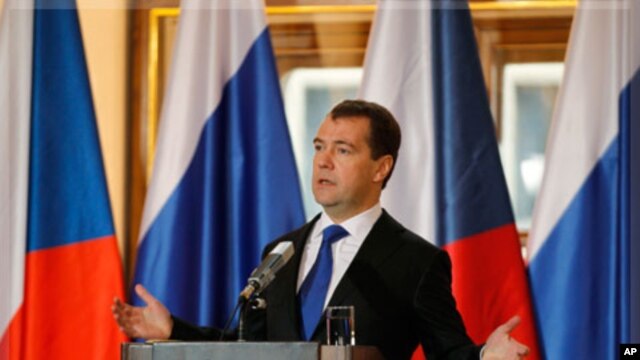 Russia's President Dmitry Medvedev attends a news conference at Prague Castle, December 8, 2011.