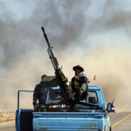 In Libya, thousands of Ghanaian migrant workers have fled fighting between rebels and loyalists to President Moammar Gadhafi.
