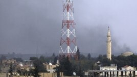 Ji bajarê Serêkanîyê hêla Tirkîyê (Ceylanpinar) xwanebûna Serêkanîyê ya binxetê anku Ras al-Ain, piştî êrîşên firokên hikûmetê. 22.11.2012