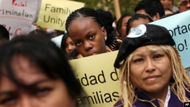 Immigrant rights supporters attend a pro-immigration rally in New York City, 19 Oct 2010