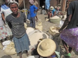 Rice merchants at local markets in Haiti say food aid cut into prices and sales.