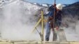 Worker checks water levels, temperatures in a series of tanks at an Encana Oil & Gas (USA) Inc. hydraulic fracturing operation at a gas drilling site outside Rifle, Colorado, March 29, 2013.