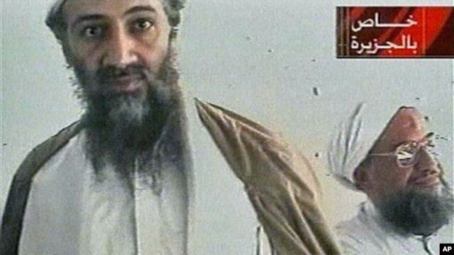 Al-Qaida leader Osama bin Laden is shown with top lieutenant, Ayman Al-Zawahri, in an image taken from a videotape broadcast on Al-Jazeera, October 2001. (file photo)