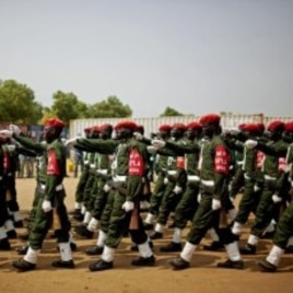 Southern Sudanese military police participate in an independence rehearsal procession in Juba, southern Sudan, July 7, 2011