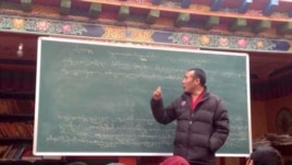 Ngawang Jamyang, a Tibetan monk, age 45, who is said to have died in police custody in China, seen teaching, unknow location, undated.