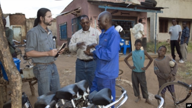 Seen here working with bike mechanics in rural Africa, F.K. Day has given away over 70,000 bikes so far in Zambia and other Sub-Saharan African countries.  
.