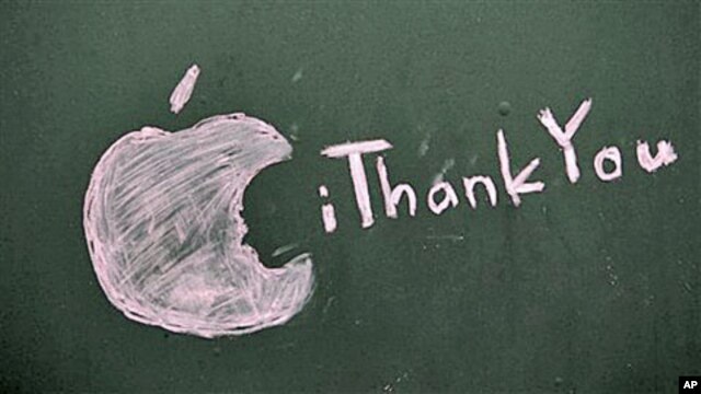 A message honoring Steve Jobs - Apple founder and former CEO - who died Wednesday, is scrawled on a blacked-out window at an Apple Store closed for the day in Seattle, October 6, 2011.