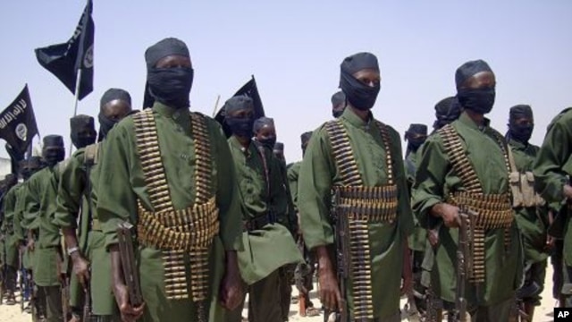 Al-Shabab fighters on parade during military exercises on the outskirts of Mogadishu (File Photo)