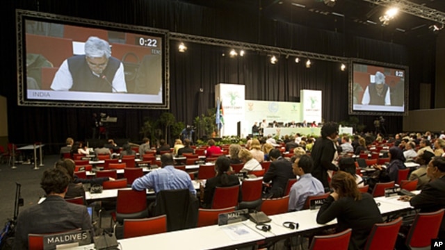 Delegates continue debating into the night during the United Nations Climate Change Conference (COP17) in Durban, South Africa, December 9, 2011.