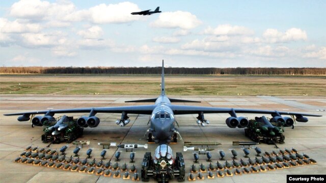 United States B-52 bomber, as shown in the above photo, is training over South Korea. (Courtesy - U.S. Air Force)