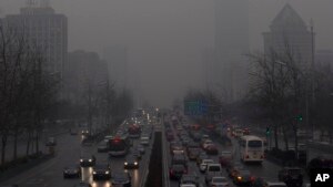 Kabut asap menyelimuti Beijing akibat polusi.