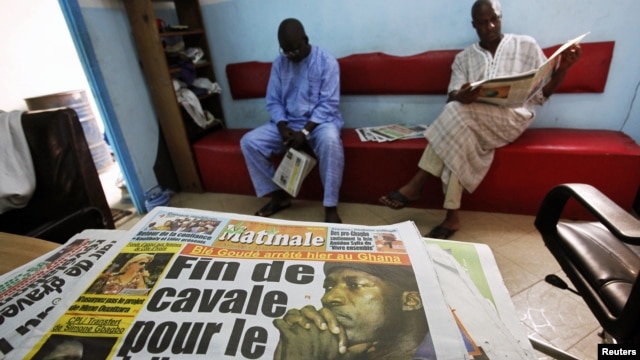 The front page of a newspaper featuring the arrest of Ivorian political leader Charles Ble Goude is seen in Abidjan, Ivory Coast, January, 18, 2013.  
