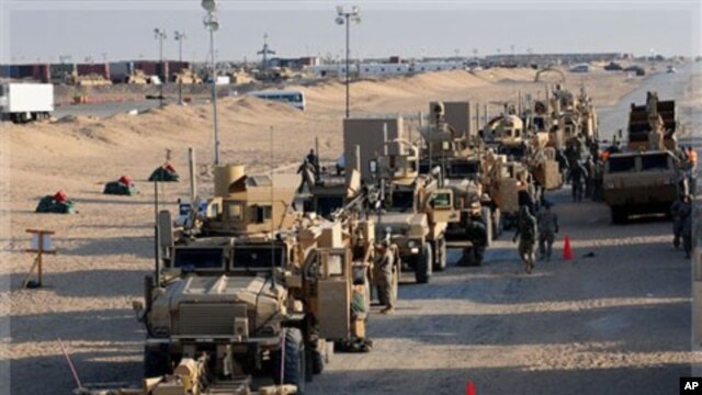 US Army soldiers from the 1st Cavalry Division, the last soldiers to leave Iraq, arrive at Camp Virginia, Kuwait, Dec. 18, 2011.