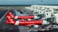 FILE - AirAsia Airbus A320-200 passenger jets are parked on the tarmac at low-cost terminal KLIA2 in Sepang, Malaysia, Nov. 10, 2014. 
