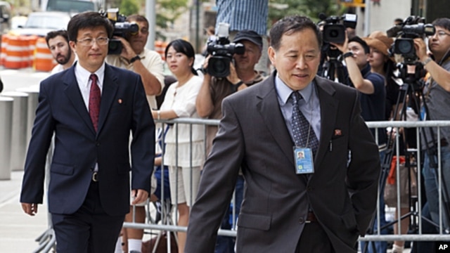 North Korean diplomats return to the Ronald H. Brown United States Mission to the United Nations, July 28, 2011, in New York