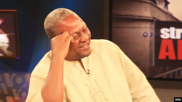 Ghana's Vice President John Dramani Mahama shares a laugh during the interview