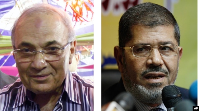 Egyptian presidential candidates Ahmed Shafiq (l), Mohammed Morsi, who will face off in a second round of voting in mid-June