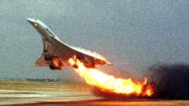 Air France Concorde on fire after striking debris on the Paris airport runway in 2000.