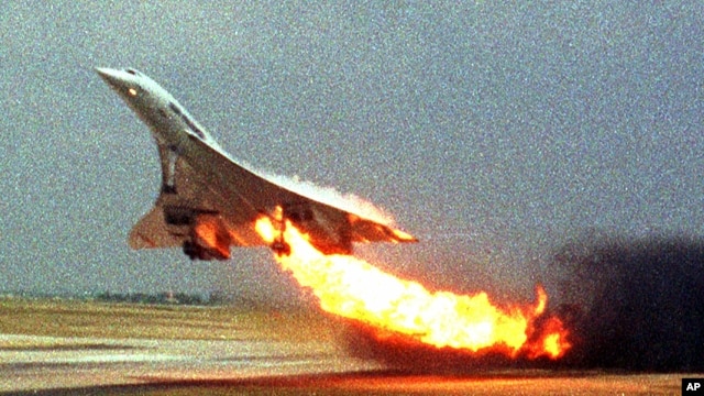 Air France Concorde on fire after striking debris on the Paris airport runway in 2000.