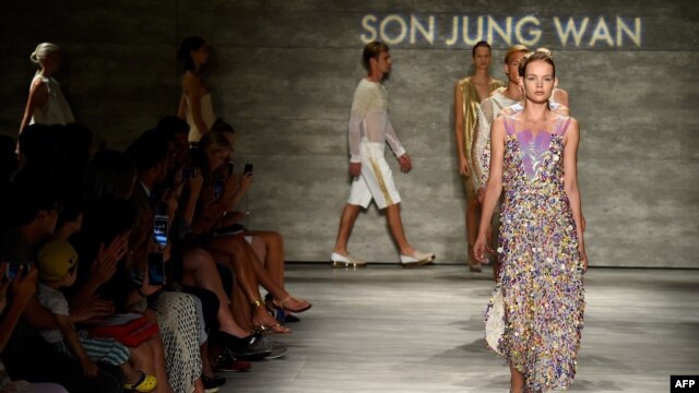 Models walk the runway at the Son Jung Wan fashion show during Mercedes-Benz Fashion Week Spring 2015 at The Pavilion at Lincoln Center, Sept. 6, 2014 in New York City.