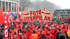 Workers and trade union representatives from all over Europe hold a demonstration against austerity near the European Commission and Council headquarters in Brussels, March 14, 2013.