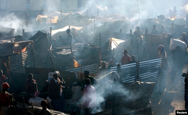 People displaced during post-election violence are seen in a temporary shelter in Burnt Forest, Kenya, Jan. 6, 2008.