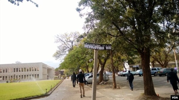 Defaced Robert Mugabe Way sign post in Bulawayo.