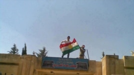 Bizavkarek li şûna ala hikûmetê Ala Kurdistanê bilind dike