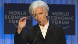 International Monetary Fund Managing Director Christine Lagarde gestures as she speaks to the assembly at the 43rd Annual Meeting of the World Economic Forum in Davos, Switzerland, Jan. 23, 2013.