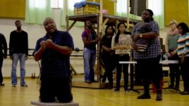 Otto Maidi, who plays Porgy in the Cape Town Opera Company's production of Porgy and Bess, sings a solo during rehearsals in June, Cape Town, South Africa. (Peter Cox/VOA)