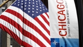 A banner is seen hanging in advance of the upcoming NATO meeting in Chicago, May 14, 2012. 