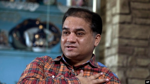 Ông Ilham Tohti, nhà hoạt động nhân quyền người Uighur đồng thời là giáo sư kinh tế, bị truy tố về tội âm mưu chia cắt đất nước.
