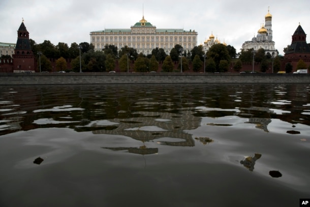 The Kremlin with its palaces and churches is reflected in the Moskva River waters in Moscow, Russia, Sept. 30, 2016. Russia has entered a second year of its military operation in Syria.