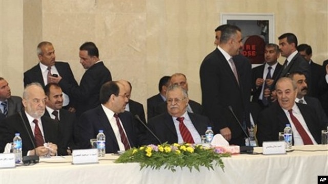Leaders of Iraq's main political blocs, front row, from left to right: former Iraqi Prime Minister Ibrahim Jafari, Iraqi Prime Minister Nouri al-Maliki, Iraqi President Jalal Talabani and former Iraqi Prime Minister Ayad Allawi, are seen during their meet