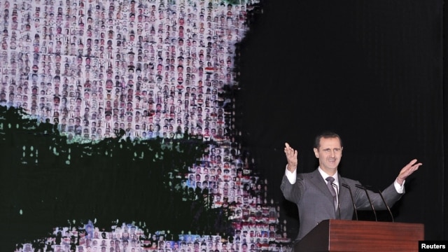 Syria's President Bashar al-Assad speaks at the Opera House in Damascus January 6, 2013, in this handout photograph released by Syria's national news agency SANA.