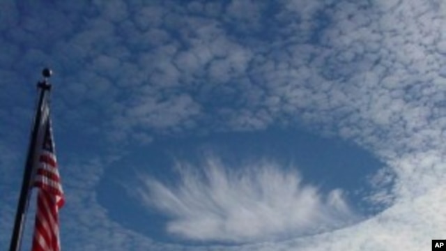 A hole-punch cloud over Alabama