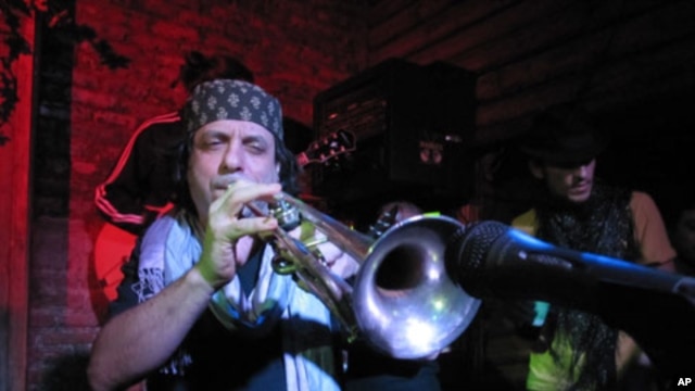 Frank London blows his horn for Haiti Relief at Mehanata, an alternative club in New York.