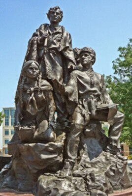The Native American guide Sacagawea stand with explorers Meriwether Lewis and William Clark on a sculpture. (FILE PHOTO)