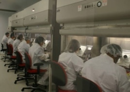 Sanaria staff produces the PfSPZ vaccine in the company's clinical manufacturing facility.