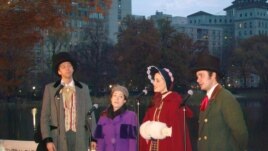A chorus dressed in colonial costume sing a Christmas song in New York's Central Park.  