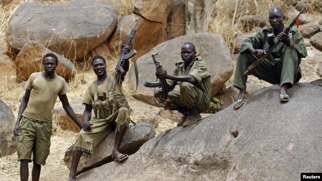 SPLA-North rebel fighters pictured near Jebel Kwo village in rebel-held territory in South Kordofan on May 2, 2012. 