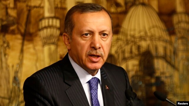 FILE - Turkey's Prime Minister Tayyip Erdogan speaks during a press conference. 