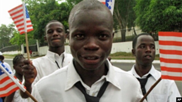 U.S. policymakers hope more people around the world will embrace the United States, like these students in Liberia
