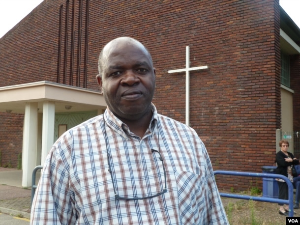 Father Auguste Moanda, a priest at St. Therese parish in St. Etienne du Rouvray and associate of the late Father Jacques Hamel, says the murder was a symbolic attack on France's Christian tradition. The Catholic community, he said, responded by stepping up efforts to engage its Muslim neighbors. (L. Ramirez/VOA)