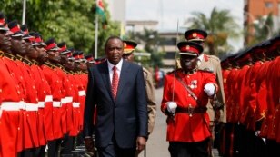 Kenya's President Uhuru Kenyatta inspects the honor guard before the opening of the 11th Parliament at the National Assembly Chamber in the capital Nairobi, Apr. 16, 2013.