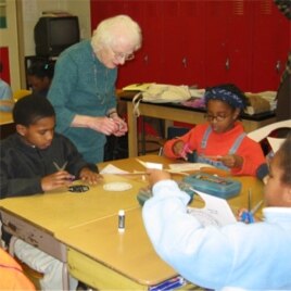 Nancy Grace Roman teaches astronomy to 5th graders at Shepherd Elementary School in Washington, DC, in the late 1990s.