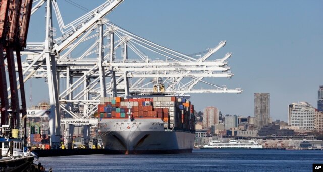 FILE - A container ship is moored at the Port of Seattle's seaport on the Duwamish Waterway. Trade is an important element of Obama's rebalance policy.