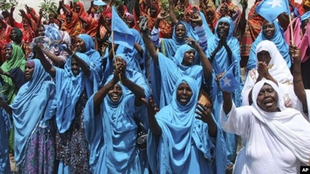 Thousands of Somalis rally in the Somali capital Mogadishu, August 23, 2011 at the Konis stadium as part of government organized demonstrations in support of the withdrawal of al- Shabab from Mogadishu.