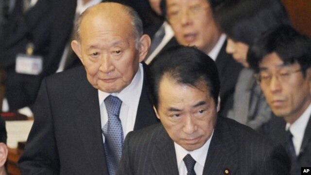 Japan's Prime Minister Naoto Kan attends lower house parliamentary session in Tokyo, 27 Jan 2011