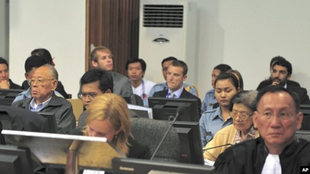 Former Khmer Rouge foreign minister Ieng Sary (2nd row from front, L) and former social affairs minister Ieng Thirith (2nd row from front, 2nd R) sit at the Extraordinary Chambers in the Courts of Cambodia (ECCC) on the outskirts of Phnom Penh June 27, 2011.